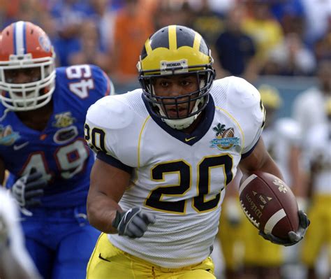 Michigan goes back to its running back roots with the hiring of Mike ...