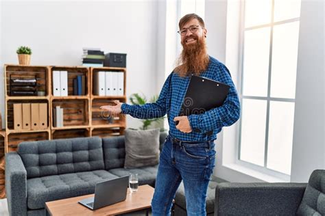 Young Redhead Man Psychology Holding Clipboard Standing at Clinic Stock Photo - Image of ...