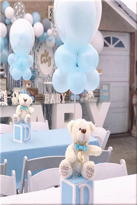 Baby shower balloon garland and centerpieces | Boy baby shower centerpieces, Baby shower ...