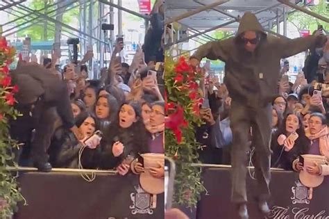 ASAP Rocky Uses Woman's Face to Climb Over Crowd Barricade - XXL