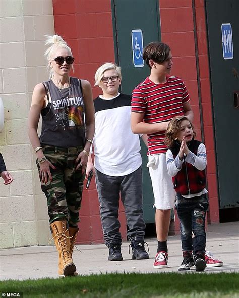 Gwen Stefani rocks casual camo look while spending some quality time at the park with her three ...