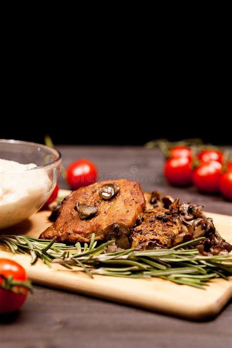 Grilled Pork Steak, Mushrooms Cherry Tomatoes And A Plate With B Stock ...