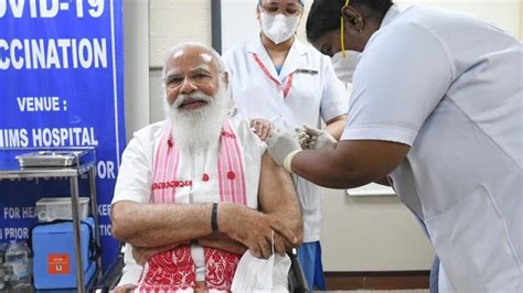 PM Narendra Modi gets Covid jab as India scales up vaccination - BBC News