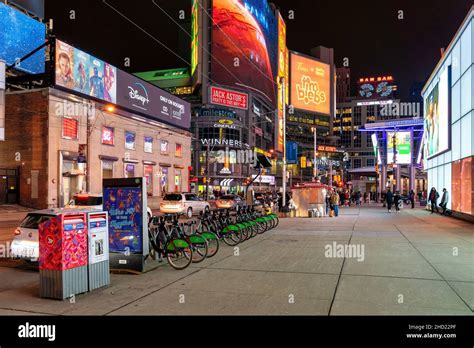 The Yonge-Dundas square in the downtown district is illuminated at ...