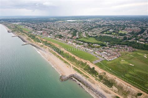 Aerial View. New Milton, Barton on Sea, Hampshire . Jason Hawkes