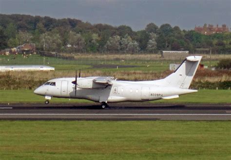 Just Visiting | N339PH Dornier 328 landing on runway 30 at P… | Flickr