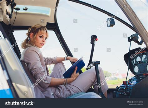 Female Pilot Cockpit Helicopter Before Take Stock Photo 1418918570 ...