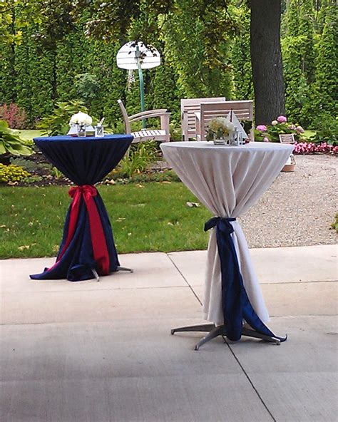 Add some elegant tall cocktail tables with a variety of colored linens and sashes to finish off ...