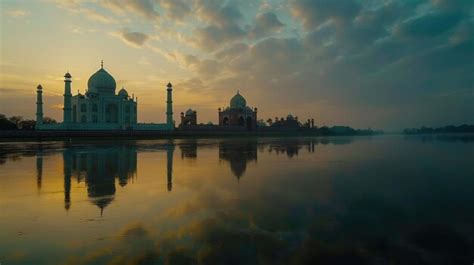 Premium Photo | Taj Mahal at Sunrise with Reflective Waters The iconic ...