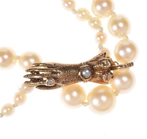 ANTIQUE PEARL NECKLACE AND DIAMOND CLASP