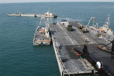 File:US Navy 110125-M-8299S-026 A U.S. Navy causeway ferry, top, docks with the Military Sealift ...