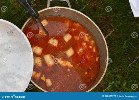 Cast-iron Cauldron with Soup at the Stake in the Courtyard. Summer Day ...