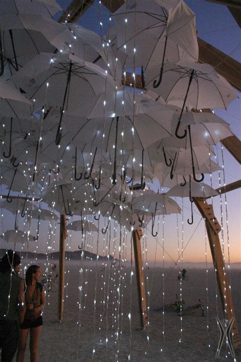 Umbrella rain Lights installations for the Burning Man festival, Nevada. Light Art Installation ...