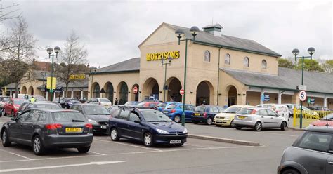 Morrisons shopper hands in huge sum of money left hanging out of cash ...