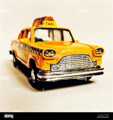 Toy model of yellow new york taxi Stock Photo - Alamy