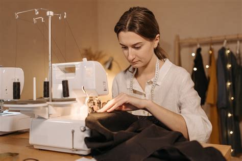 Dressmaker Sewing Fabric on Sewing Machine · Free Stock Photo