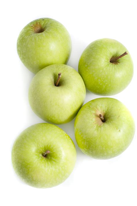 Five crisp healthy green apples - Free Stock Image