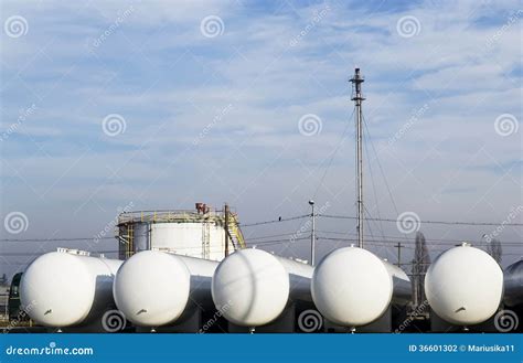 Natural gas storage tanks stock photo. Image of truck - 36601302