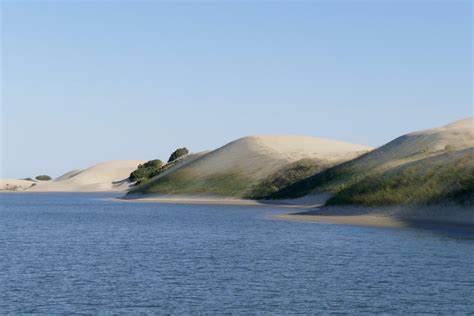 Sliding down sand dunes in South Africa - Act of Traveling