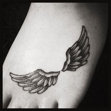 Pin by Erin Einberger on Tattoos | Wings tattoo, Angel wings tattoo, Tattoos