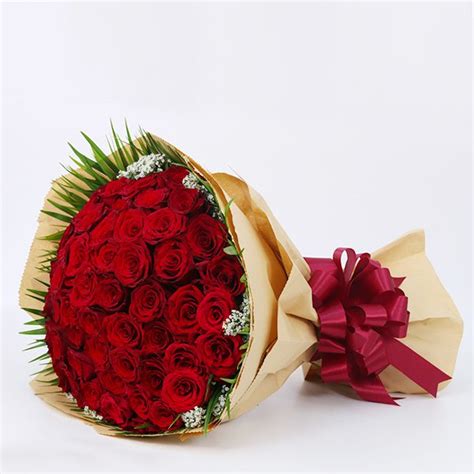 Buy/Send Valentines day Bouquet of 50 Red Roses | JuneFlowers