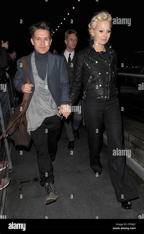 Mark Owen of 'Take That' and his wife Emma Ferguson arriving at the Savoy Pier. The BRIT Awards ...