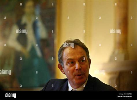 Britain's Prime Minister Tony Blair attends a round table meeting with John Hutton, in Downing ...