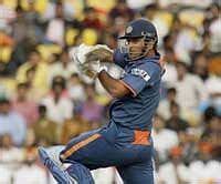 Dhoni century lifts India to big total