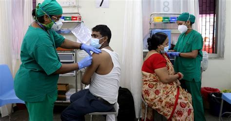 India’s vaccinations plummet as coronavirus infections soar | Reuters