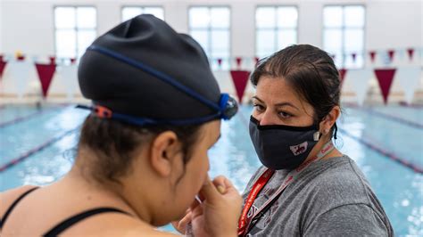 This southwest Detroit high school swim coach uses sport to build community