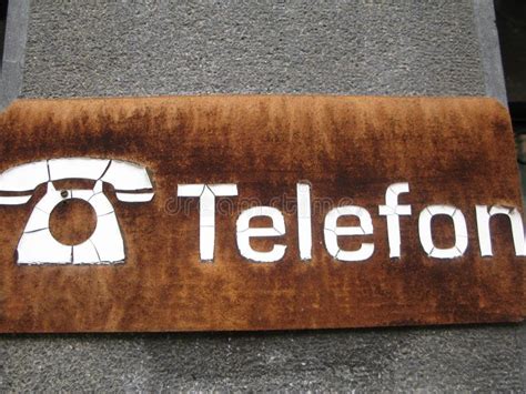 Telephone Symbol Icon on Rusty Manhole Cover. Stock Image - Image of ...