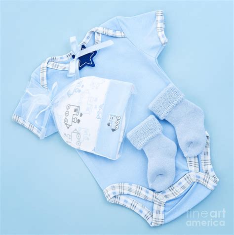 Blue baby clothes for infant boy Photograph by Elena Elisseeva