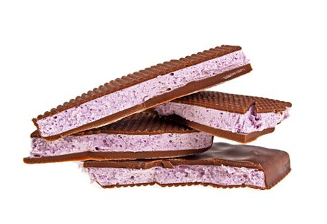 Blueberry Nougat In Chocolate On A White Background Stock Photo - Download Image Now - iStock