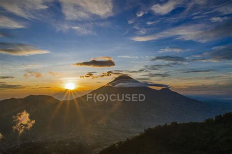 Dieng Plateau at sunrise, Wonosobo, Central Java, Indonesia — sunburst ...