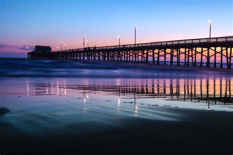 Pier during sunset in Long Beach - Click&Boat Blog