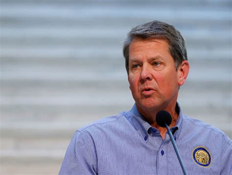 Georgia Governor Brian Kemp speaks to the media during a press ...