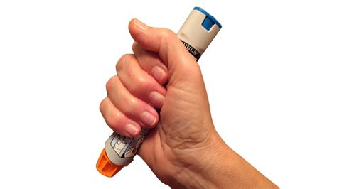 How does an adrenaline auto-injector work?