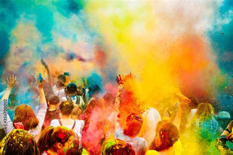 Holi color festival. Celebrating dances. Throwing colored powder ...