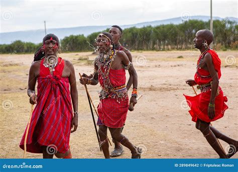 Masai in Traditional Colorful Clothing Showing Maasai Jumping Dance at ...