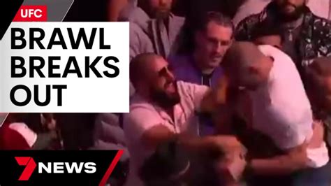 Vicious crowd brawl breaks out between fighters at UFC 296 | 7NEWS