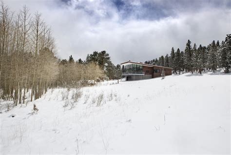 Snow, Contemporary Cabin in the Rocky Mountains