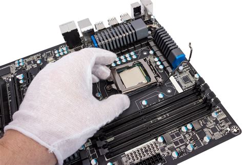 Premium Photo | Installation of modern processor in CPU socket on the motherboard