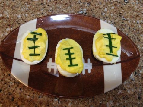 Football deviled eggs I made for a football themed bunco night | Football deviled eggs, Bunco ...