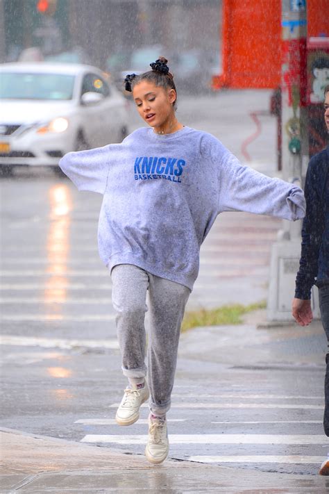 10 Practical Rainy-Day Outfits to Steal From Celebrities in 2021 | Glamour