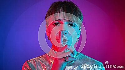 Portrait Woman Says Hush Finger on Lips Art Colorful Lighting Indoors Stock Footage - Video of ...