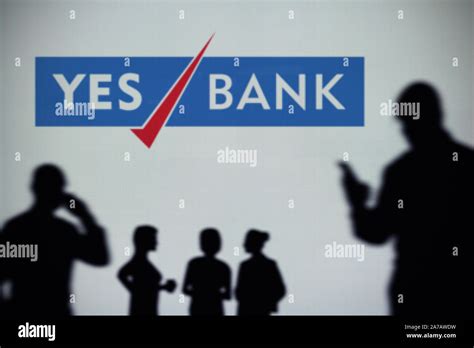 The Yes Bank logo is seen on an LED screen in the background while a ...