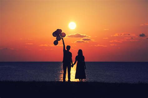 Two people at sunset 1864707 Stock Photo at Vecteezy