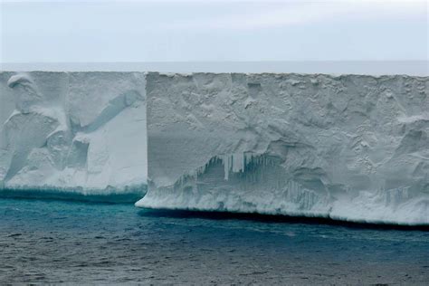 Meltwater may fracture Antarctic ice shelves and speed sea level rise ...