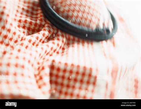 Red and white checked keffiyeh, close-up Stock Photo - Alamy