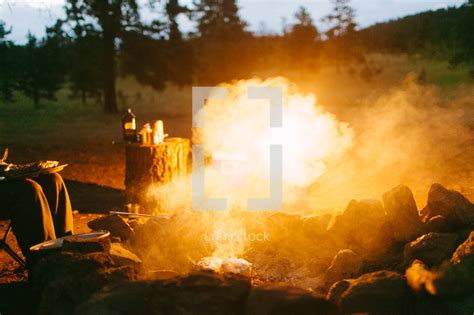 Flames and smoke from a campfire — Photo — Lightstock